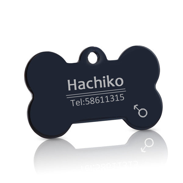 Black bone-shaped pet ID tag with example engraving