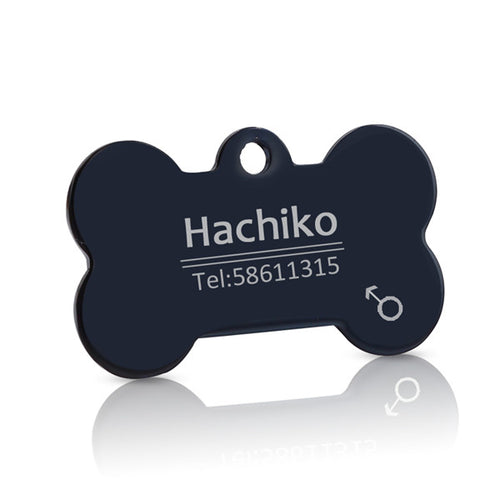 Black bone-shaped pet ID tag with example engraving