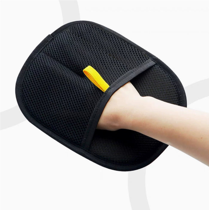 Hand inside the pet hair removal glove